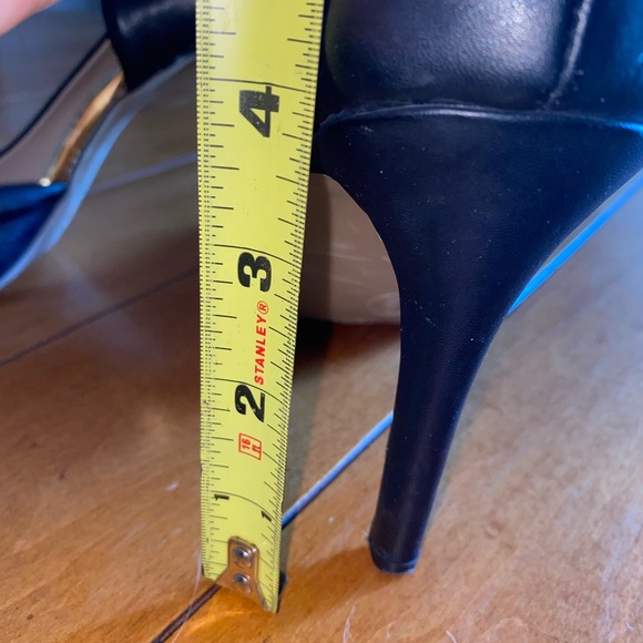 Simple black pointed toe pumps with gold detail. - Picture 6 of 6